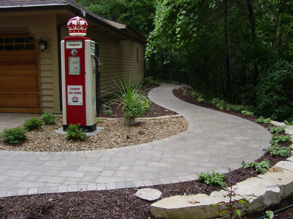 The start of the walk with natural wall stone to hold the grade level.