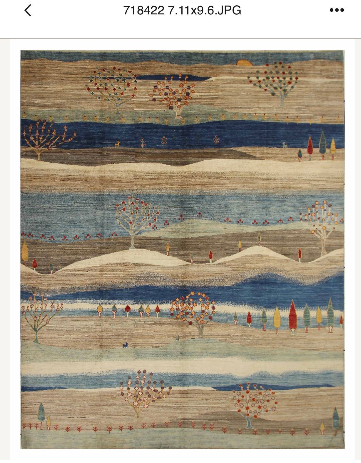 Rug with trees and mountains design