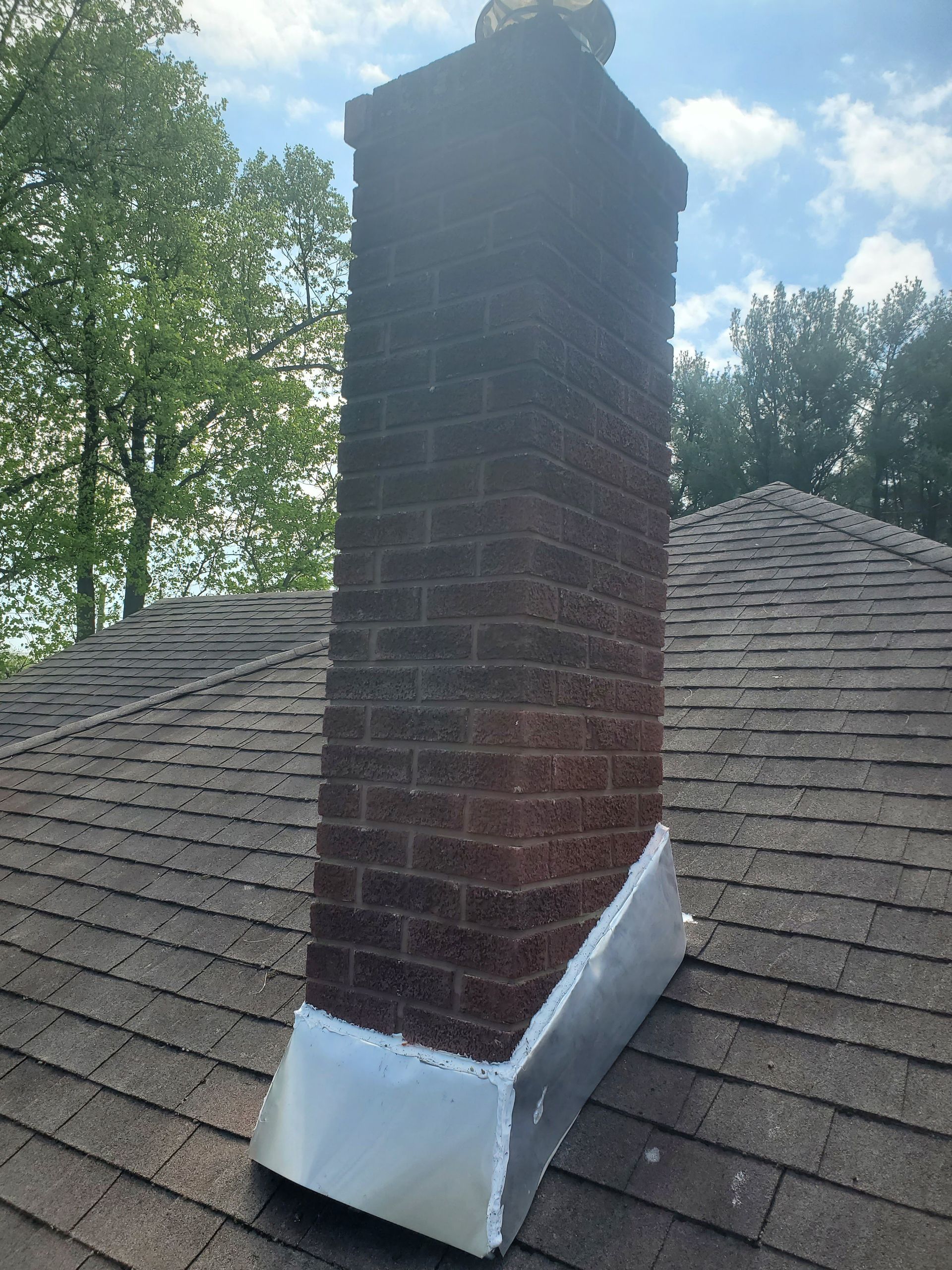 Brick chimney on roof