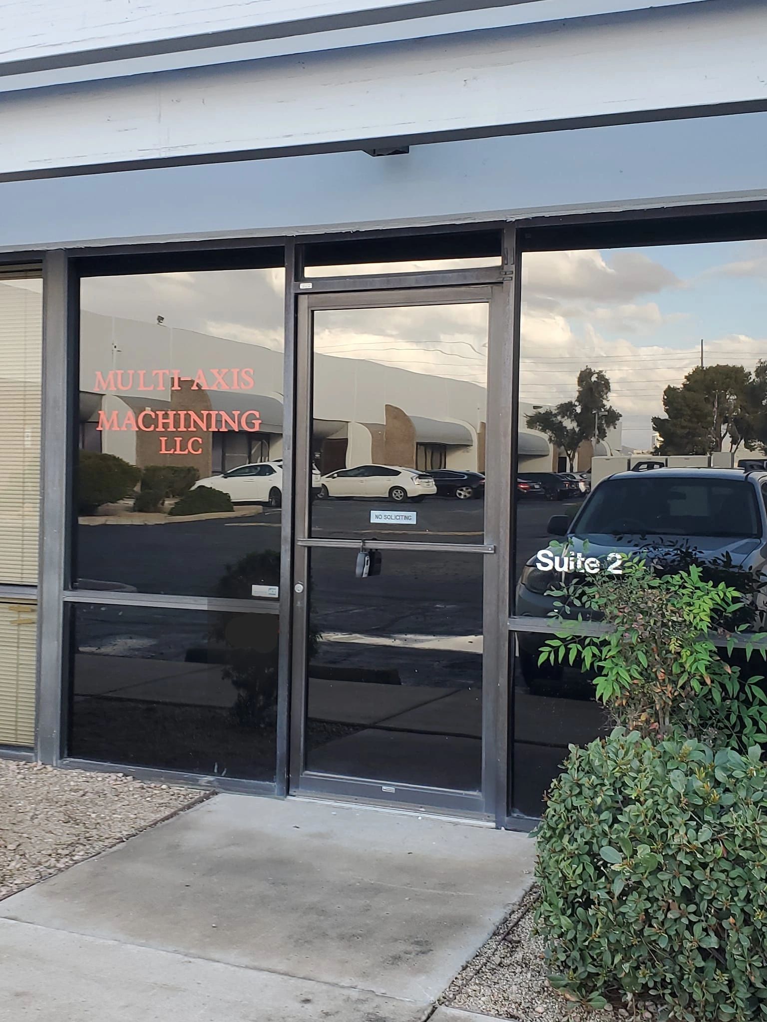 An exterior view of a business entrance labeled