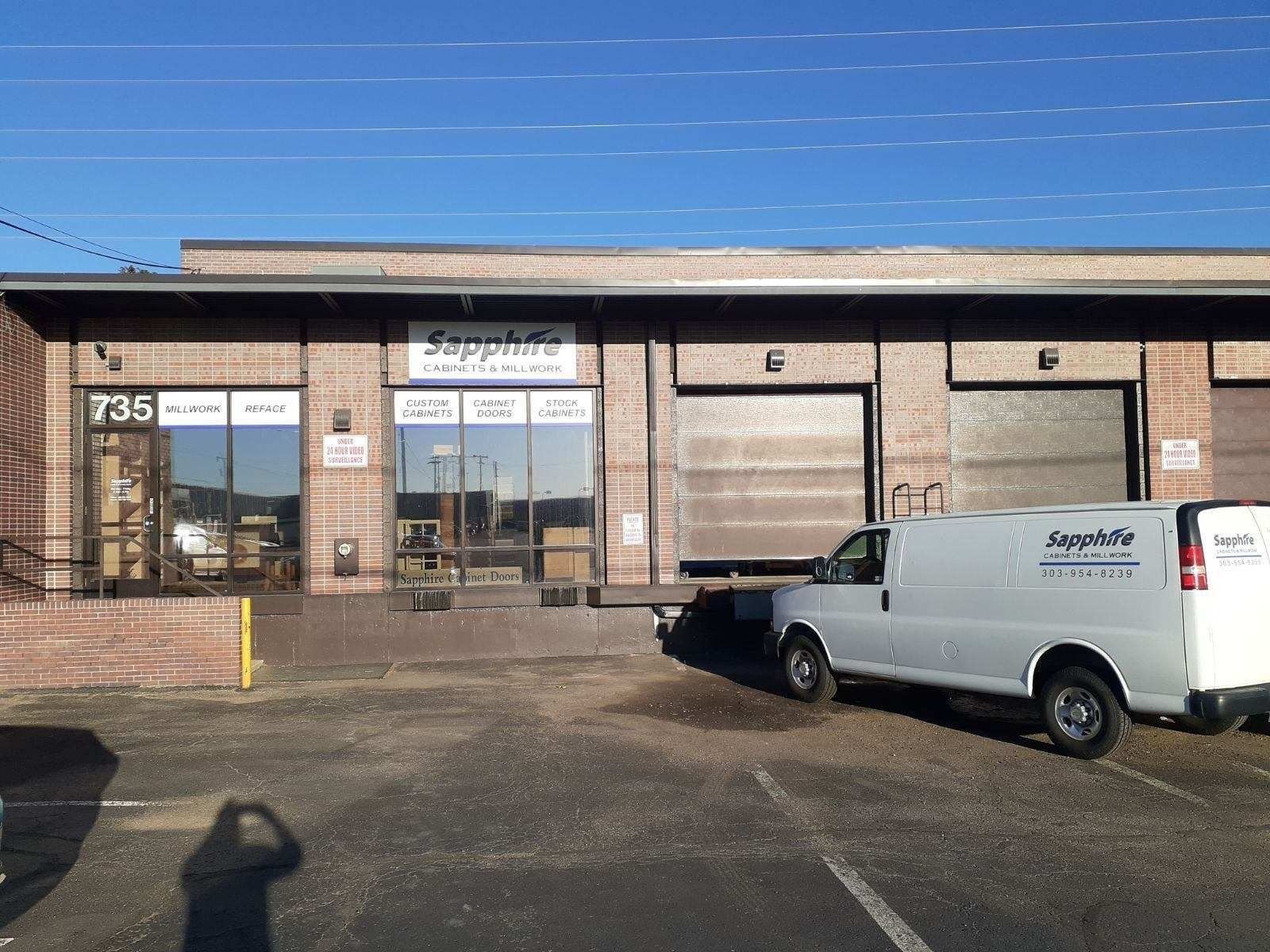Exterior of Sapphire Air, Heating & Cooling business with a parked white van.