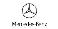 Mercedes-Benz logo: a silver three-pointed star inside a circle, with the words 