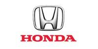 The Honda logo in red lettering on a white background.
