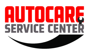 Red "AUTOCARE" over gray "SERVICE CENTER", with a wrench icon, and a black arc underneath.