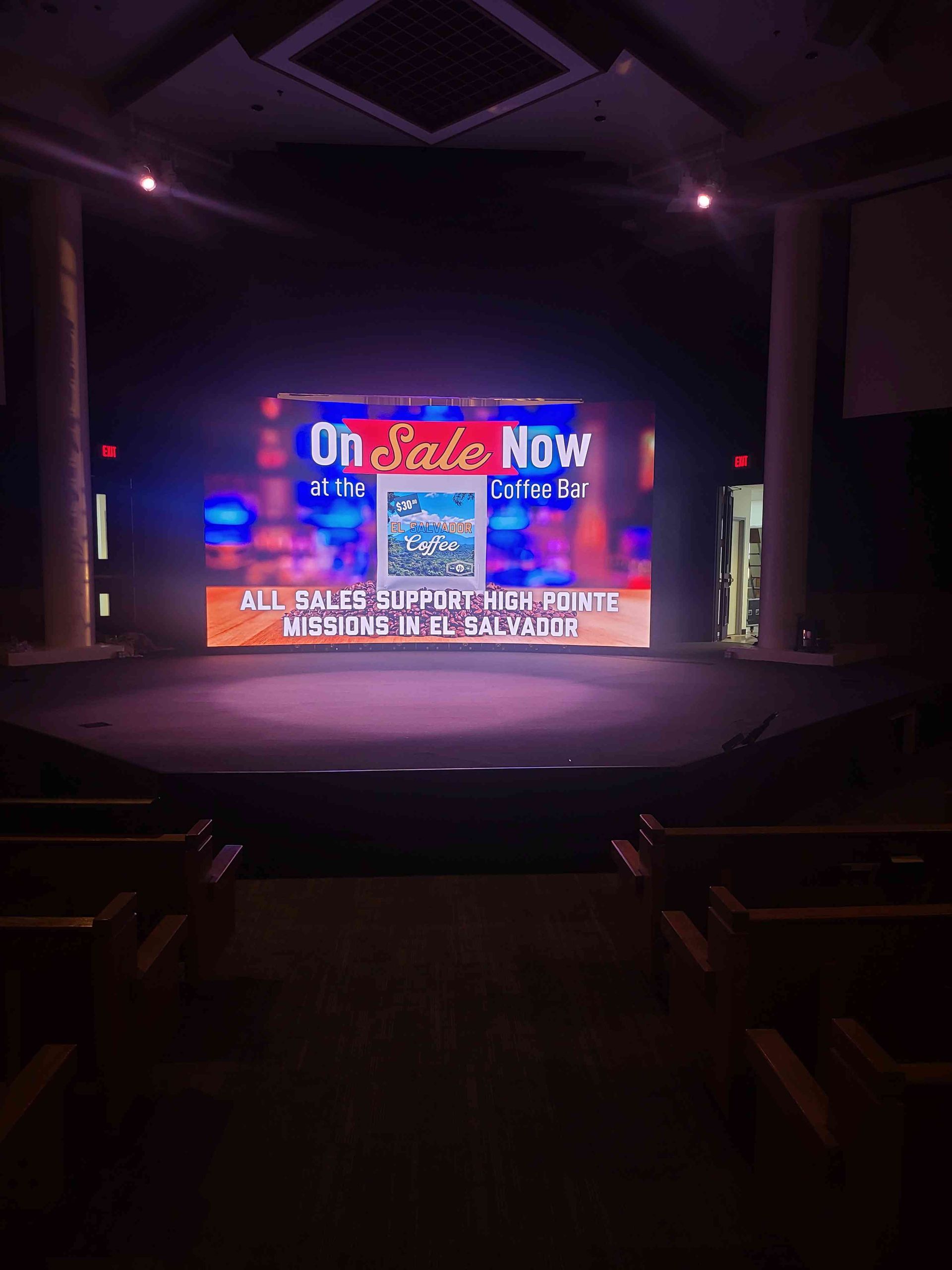 Auditorium with a stage displaying 