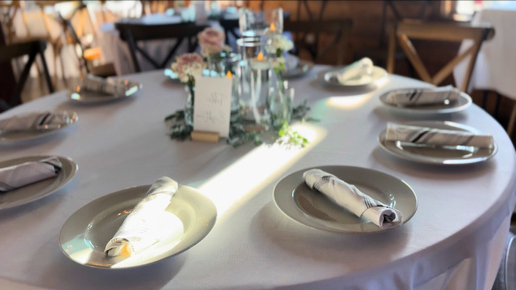A long table with a bunch of buffet dishes on it.