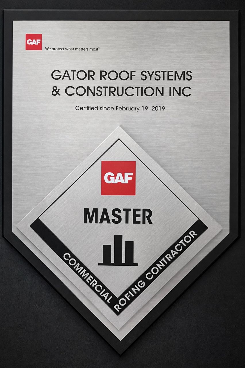 A GAF Master Commercial Roofing Contractor certification plaque awarded to Gator Roof Systems & Construction Inc in 2019.