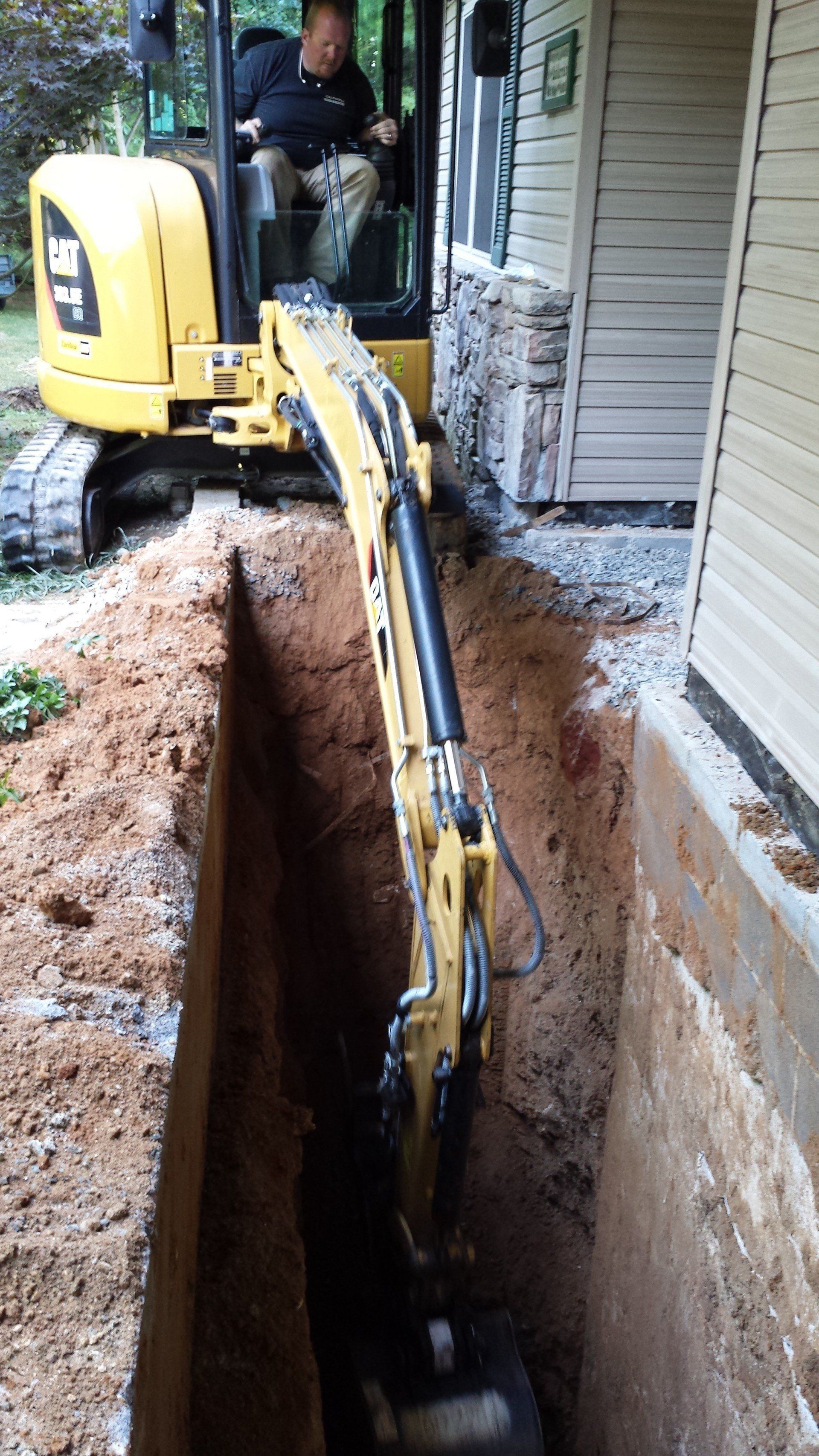 Excavating around the foundation
