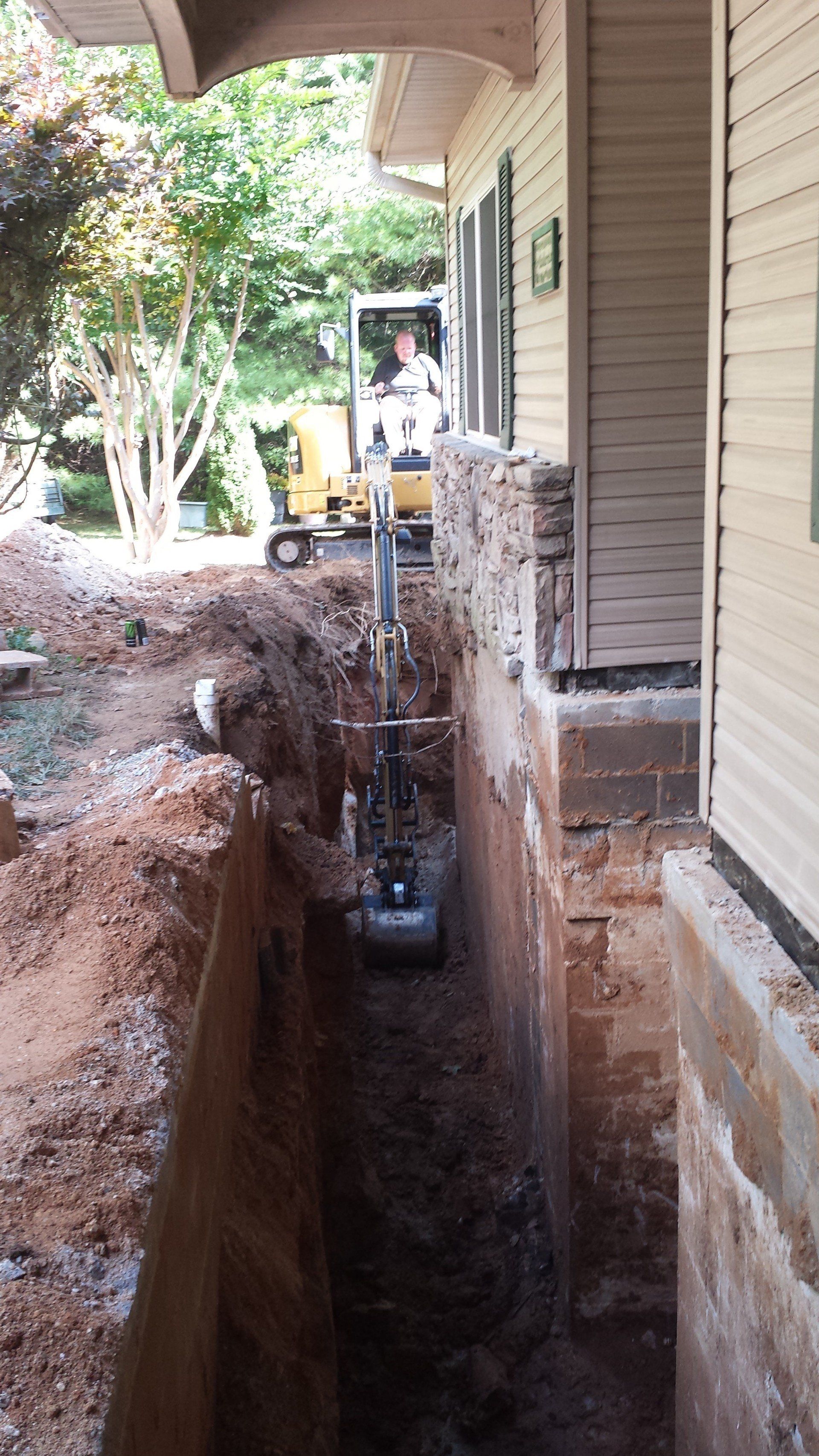 Excavating around the foundation