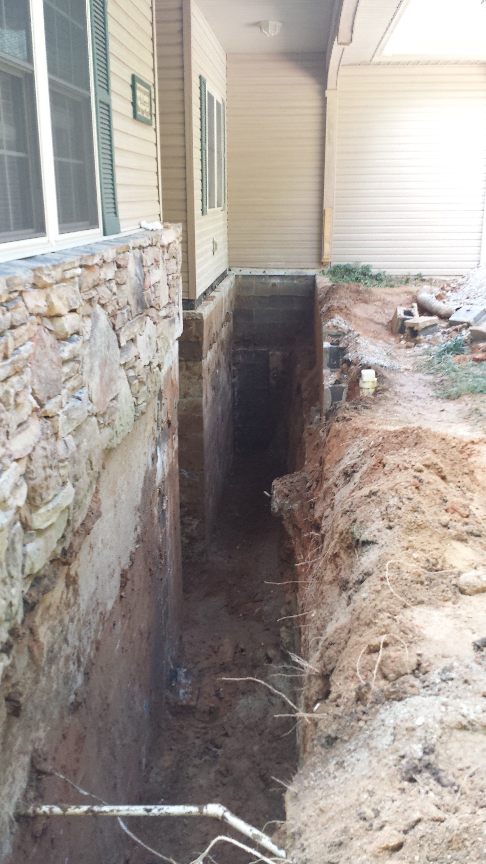 Excavating around the foundation