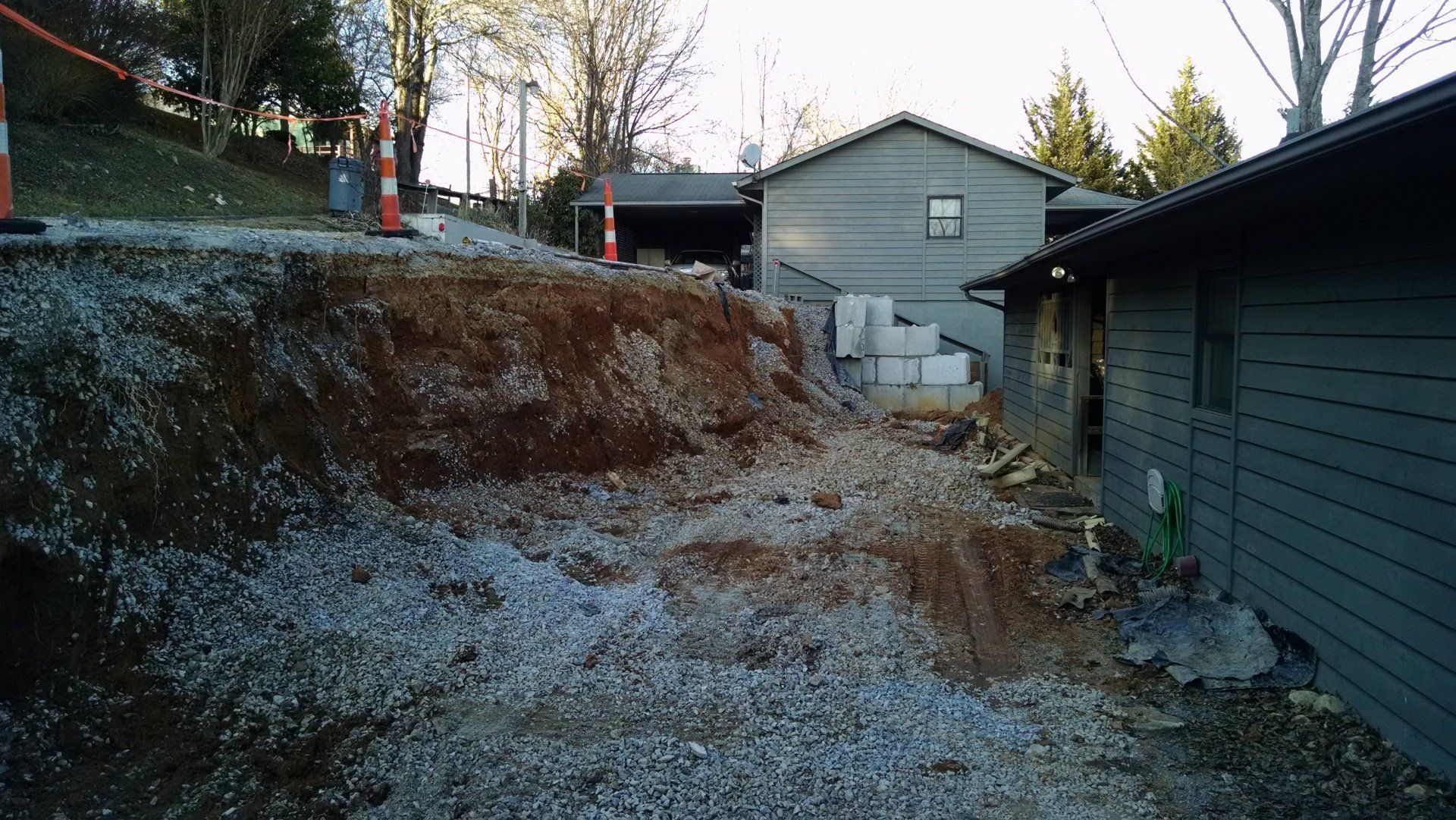 Engineered footer for reconstruction of wall failure