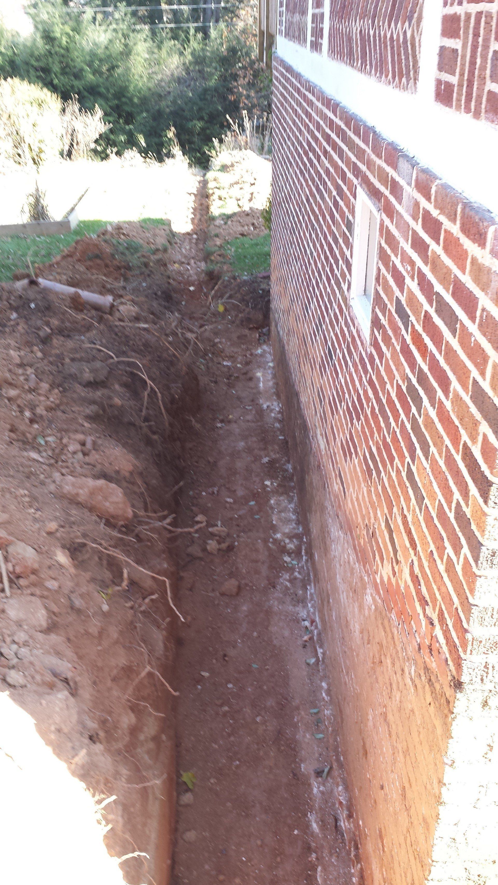 Excavating around the foundation