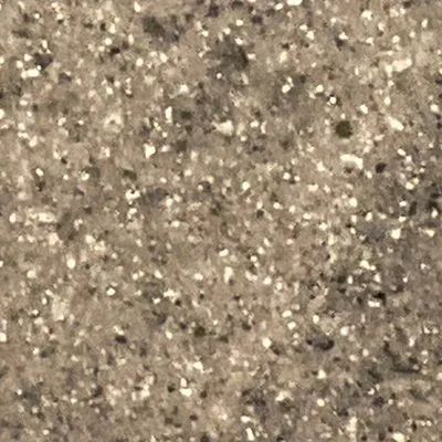 Close-up of a speckled beige and gray textured surface