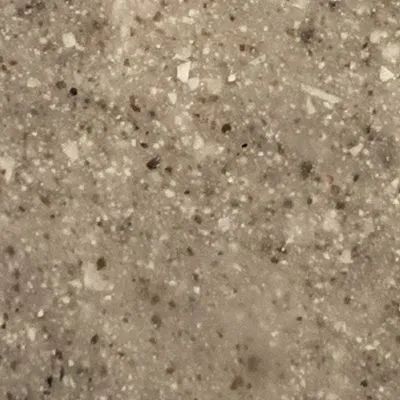Close-up of a speckled beige and brown textured surface
