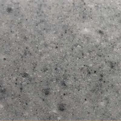 Close-up of a gray speckled stone or concrete surface