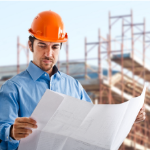 Contractor looking at the construction site map