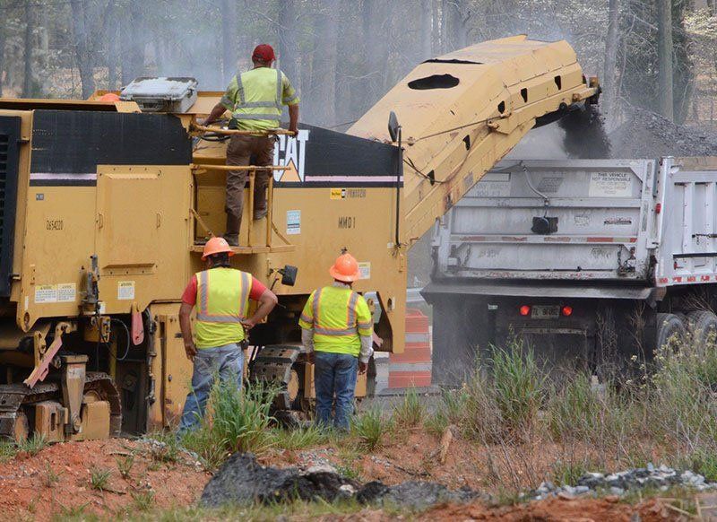 Transferring Asphalt toTruck