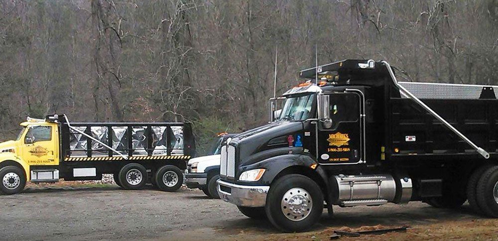 Michael's Asphalt Paving Trucks