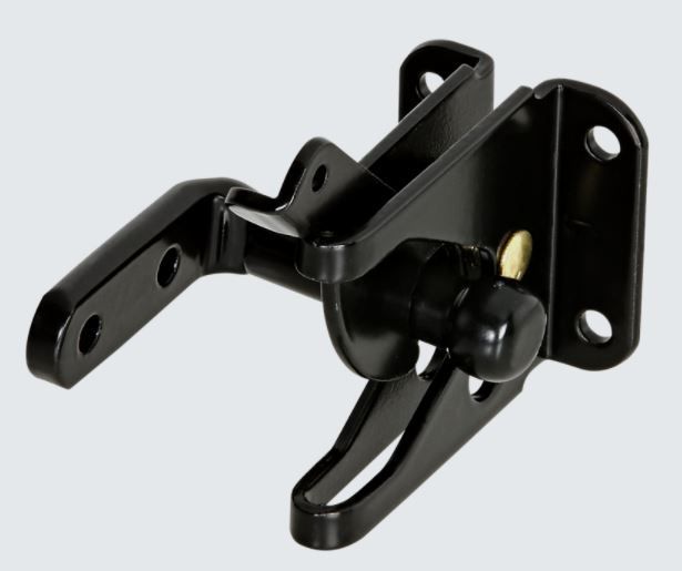 A black metal gravity gate latch mechanism shown from an angle against a plain background.