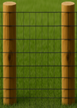 Two vertical wooden posts connected by a black wire mesh fence set against a green lawn background.