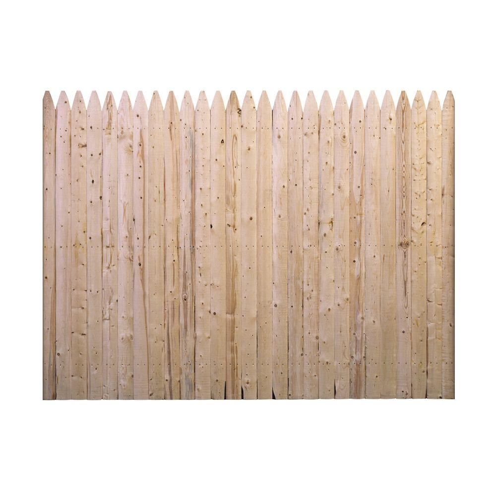A light-colored wooden picket fence section with a pointed top, featuring vertical planks with natural wood grain.