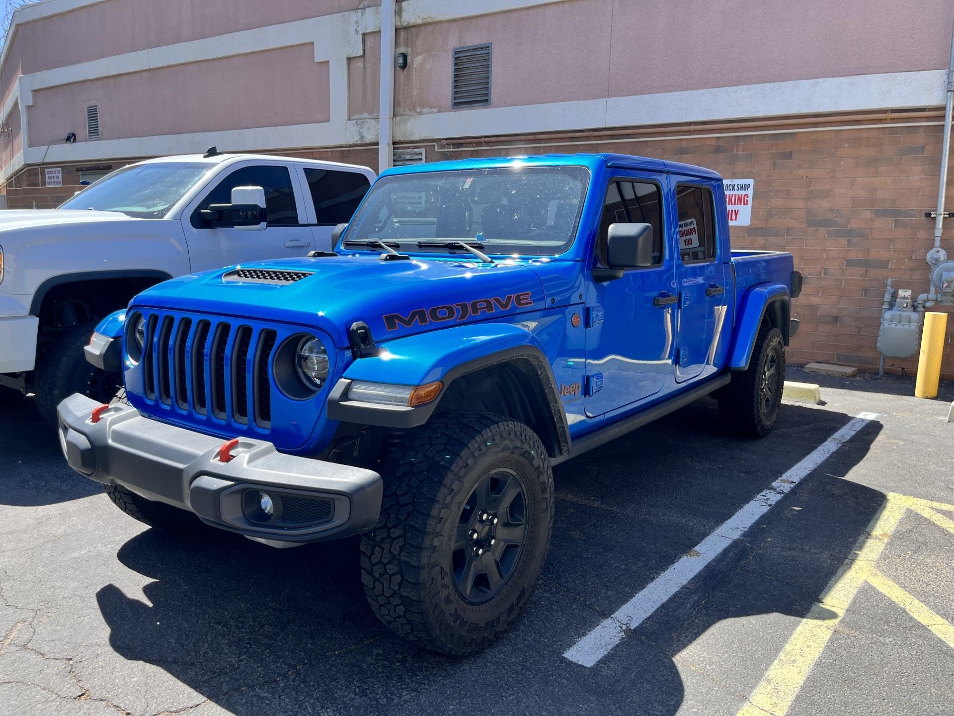 Blue Jeep pickup truck