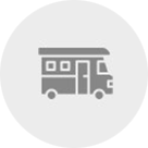 An icon of a rv in a circle on a white background.