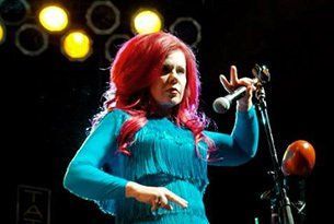 Girl with the red hair on stage