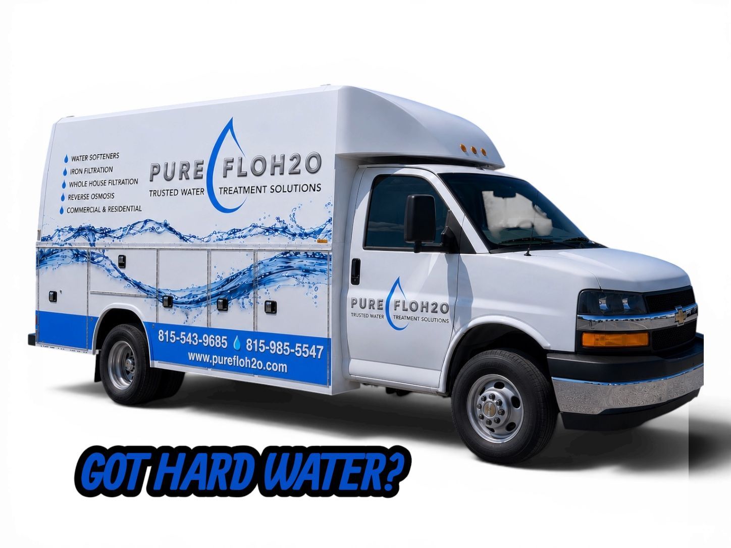 Pure H2O water delivery truck, white and blue, with Got hard water? text.