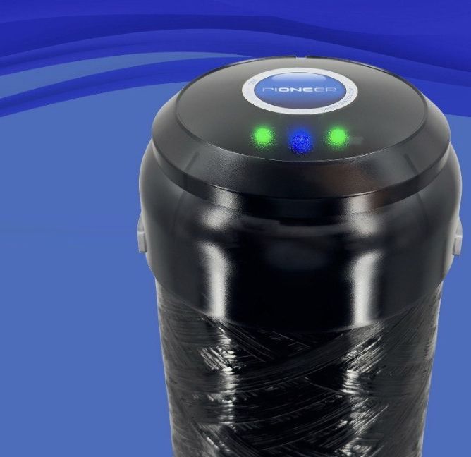 Three cylindrical water heaters and HVAC equipment in a utility room.