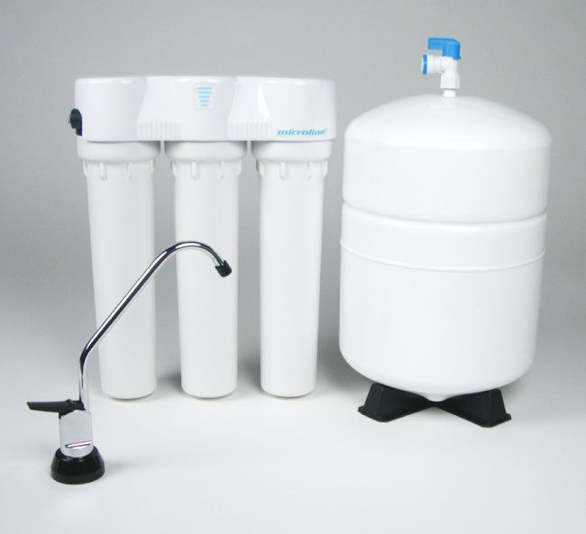 White water filtration system with faucet, tank, and three filter cartridges.