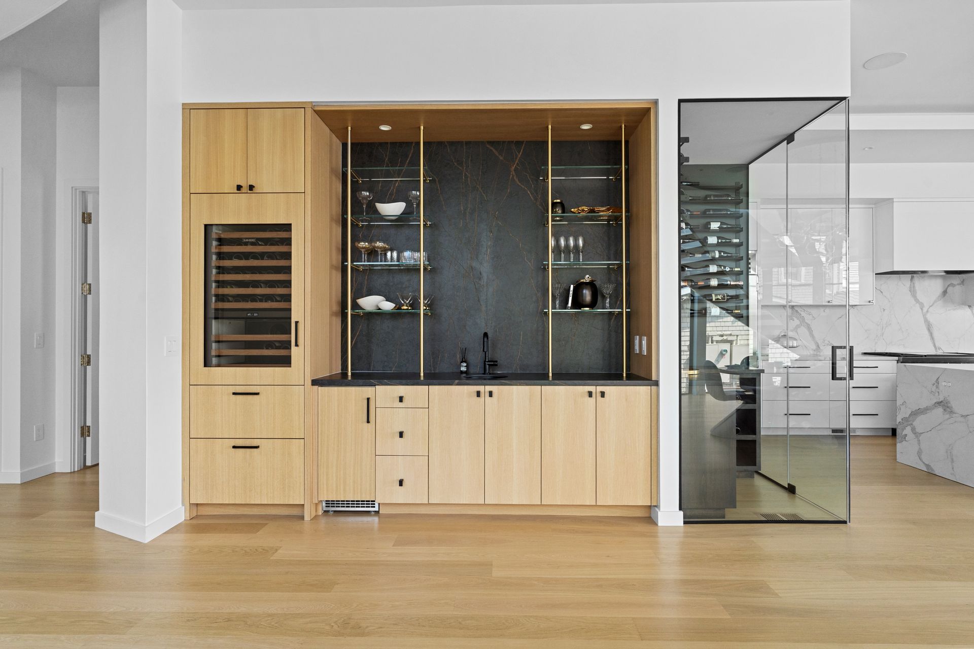 A kitchen with a microwave and a refrigerator