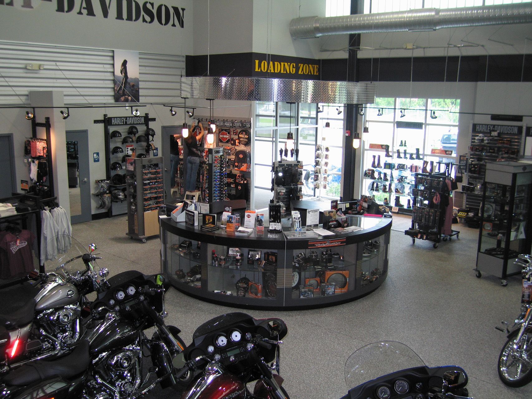 A harley davidson store with motorcycles on display