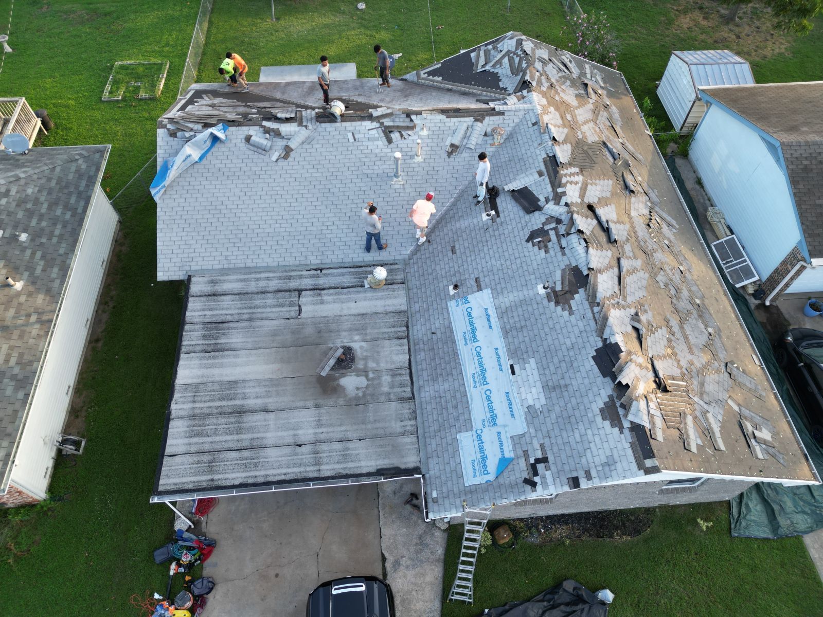 An aerial view of a house that is being remodeled