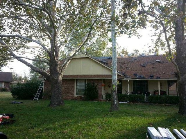 A house with a ladder in front of it