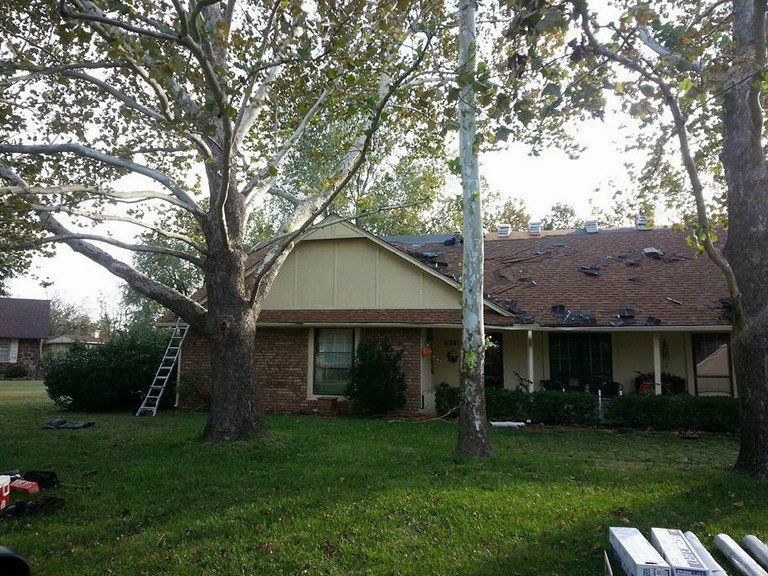 A house with a ladder in front of it