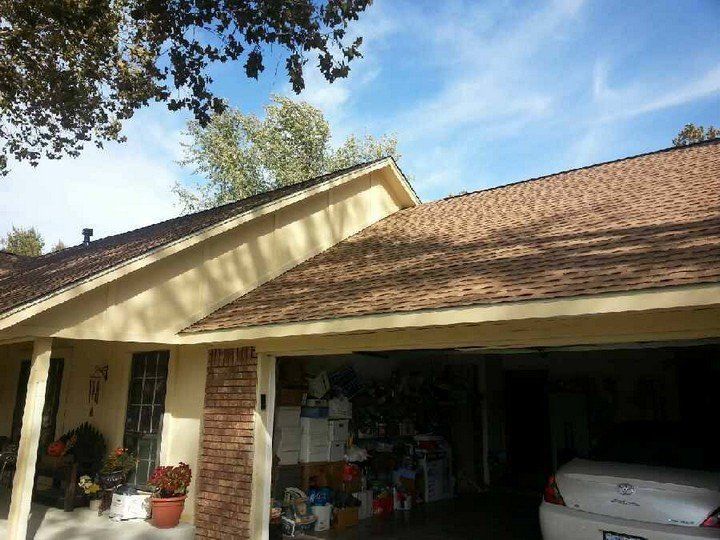 A car is parked in the garage of a house