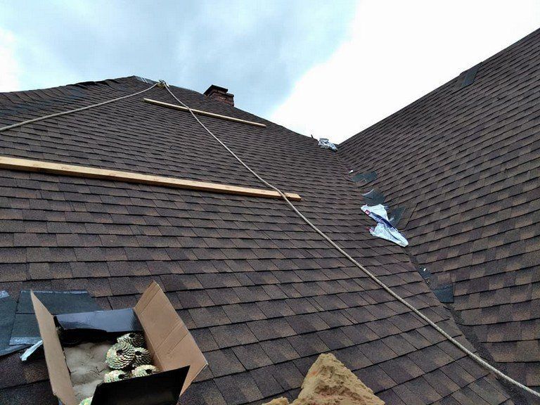A roof with a box on top of it