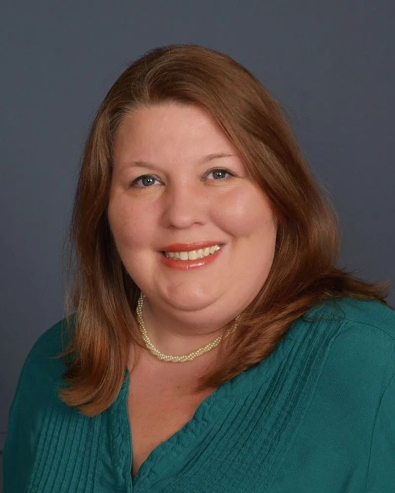 Photo of {{Team Member Name}}