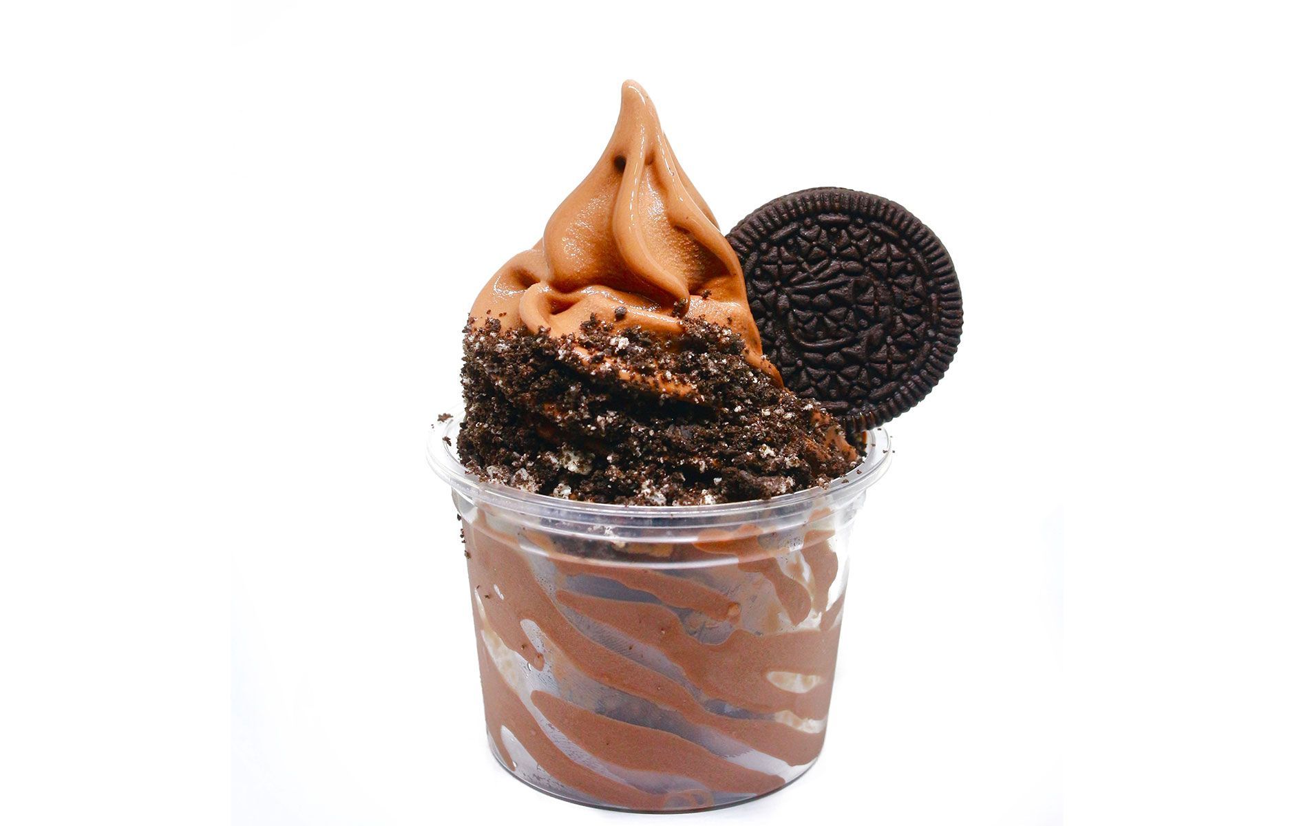 A cup of chocolate ice cream with oreos on top.