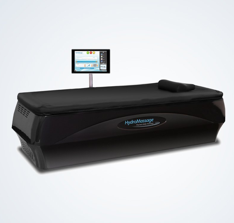Black HydroMassage bed with touchscreen display; used for massage therapy.