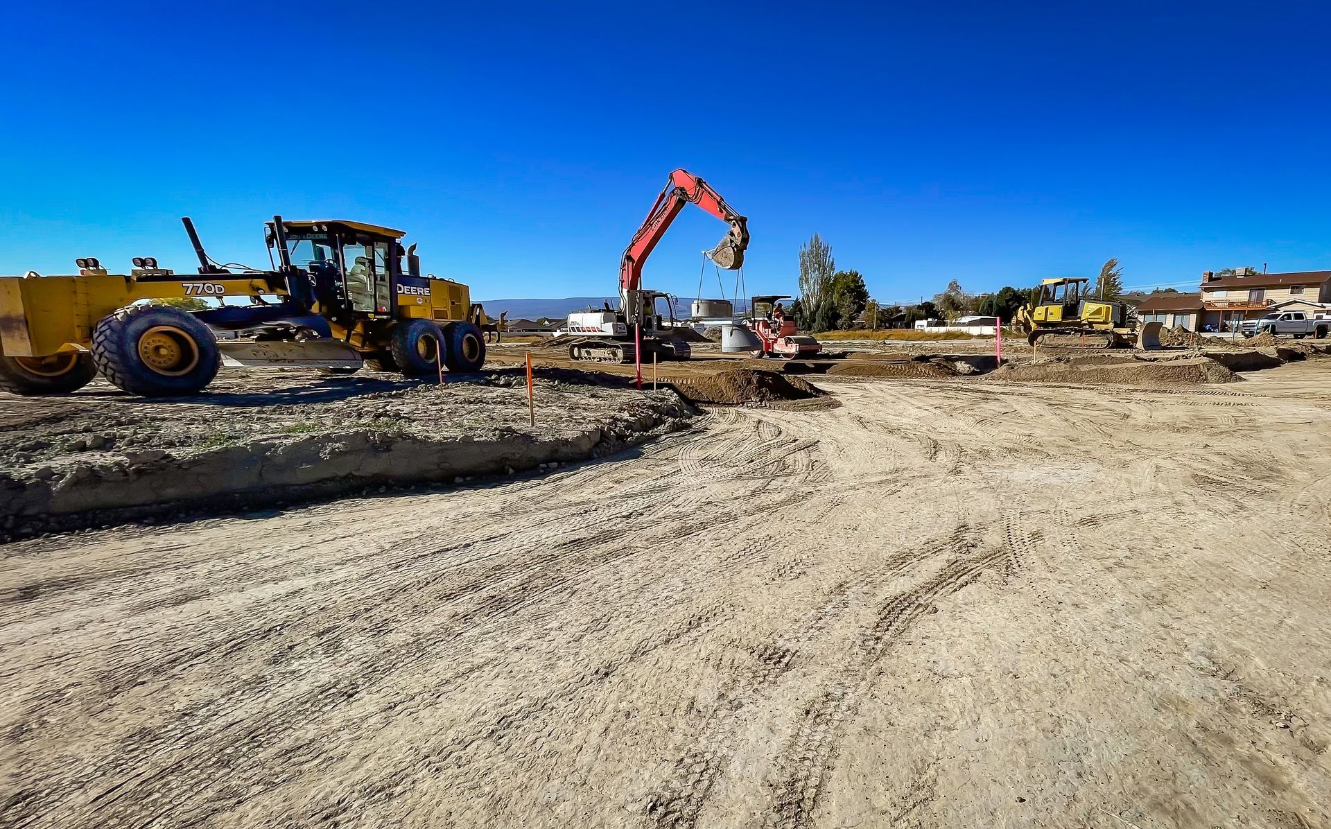 A construction site with a lot of machinery on it