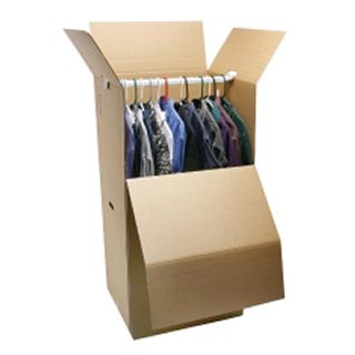 A cardboard wardrobe box with clothes hanging on a rod. The box is open, filled with shirts and other clothing.