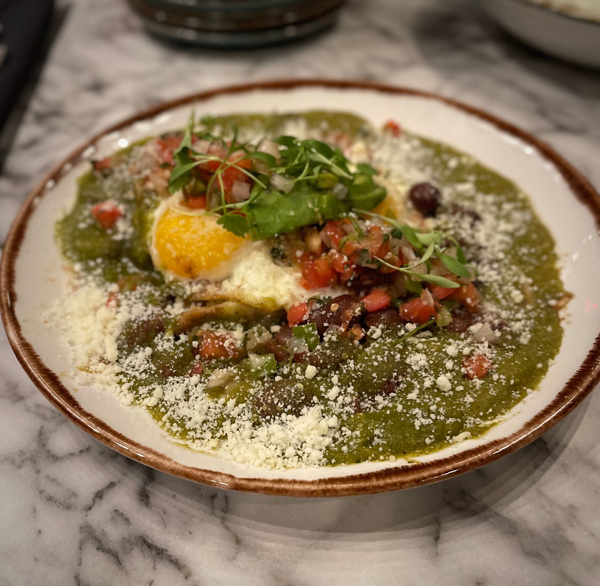 A close up of a plate of food on a table