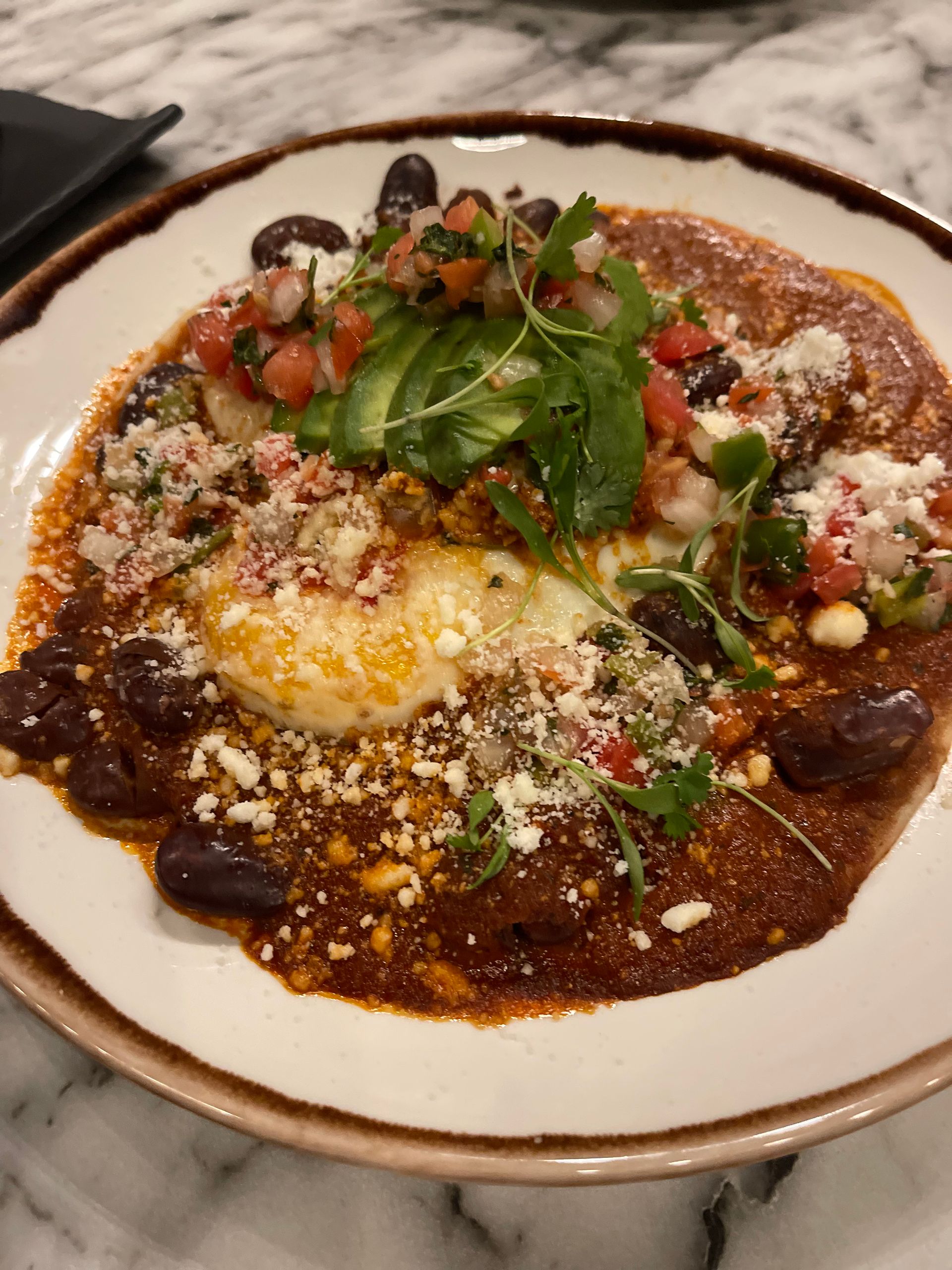 A close up of a plate of food on a table.