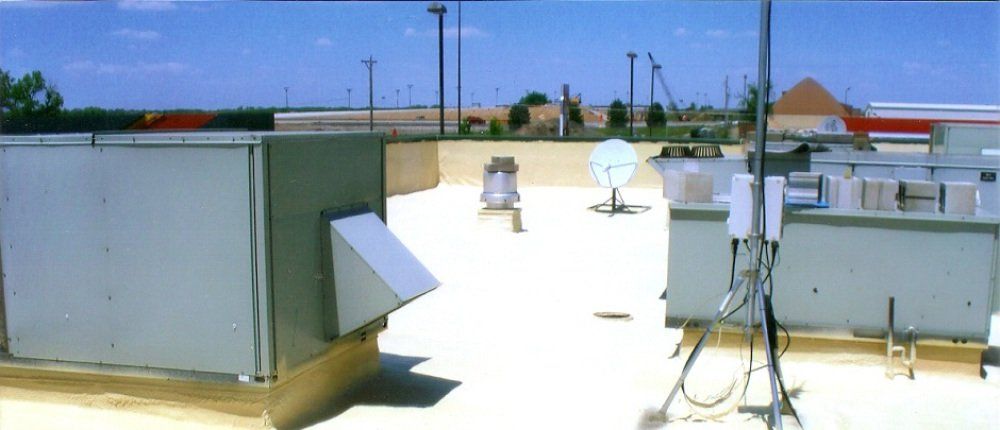 Spray polyurethane foam roofing