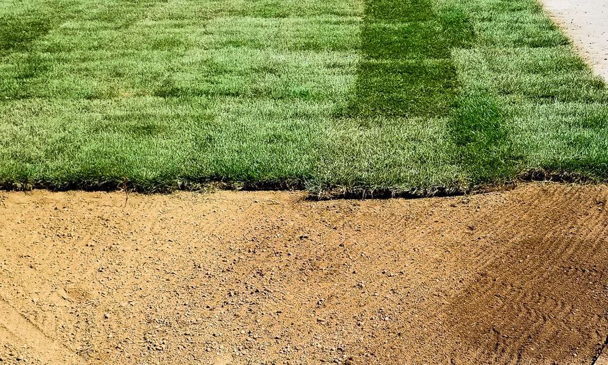 A picture of a lawn before and after being installed.