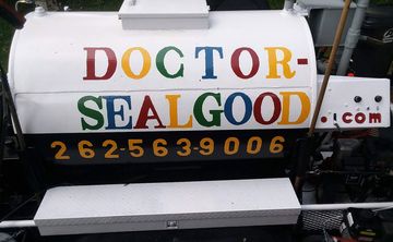 truck with a sign that says doctor sealgood on it