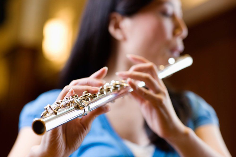 Woman playing the flute