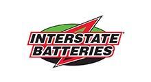 Interstate Batteries logo: Red, white, and black text with a red arrow on a green and black background.